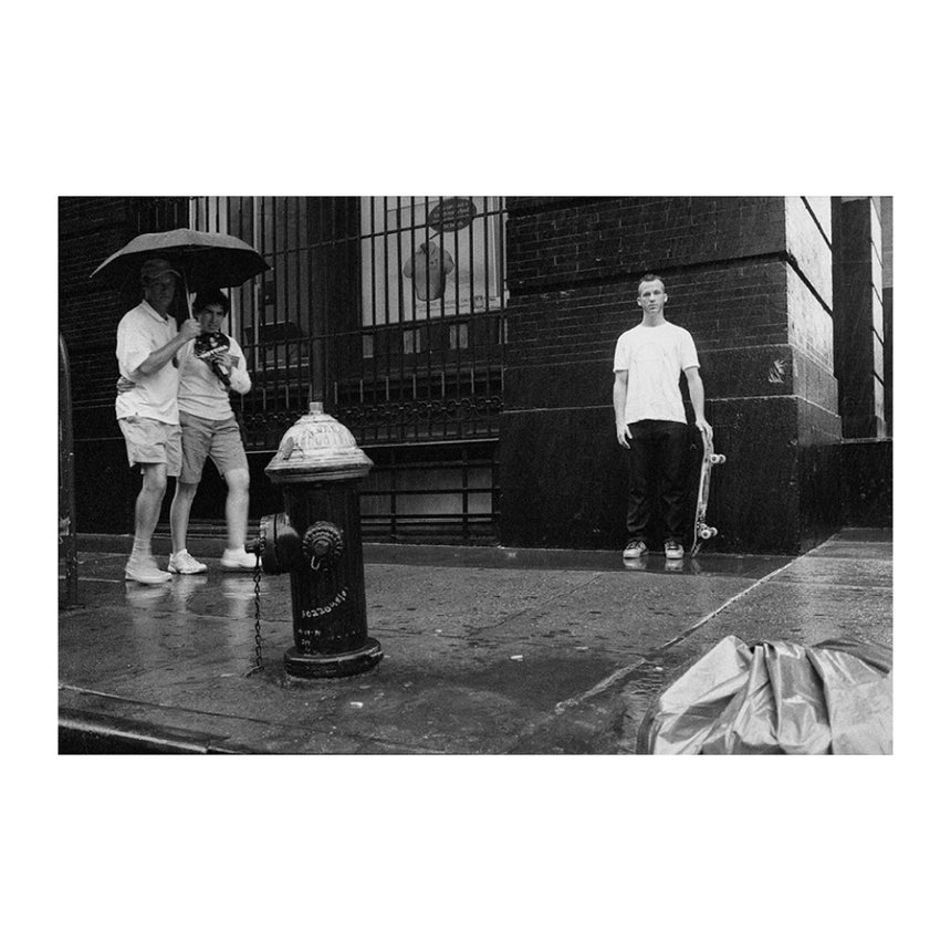 NINETY-SIX DREAMS, TWO THOUSAND MEMORIES<br />Greg Hunt<br />Jason Dill standing in the rain, NYC, 2005